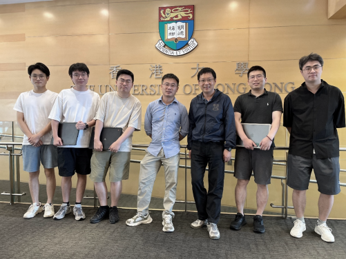 Professor Shiming Zhang (third from the right), Professor Jingqiang Wang (fourth from the right) and research team members

 